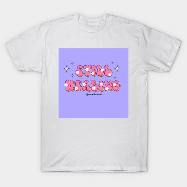 Still healing T-Shirt by Ranaawadallah